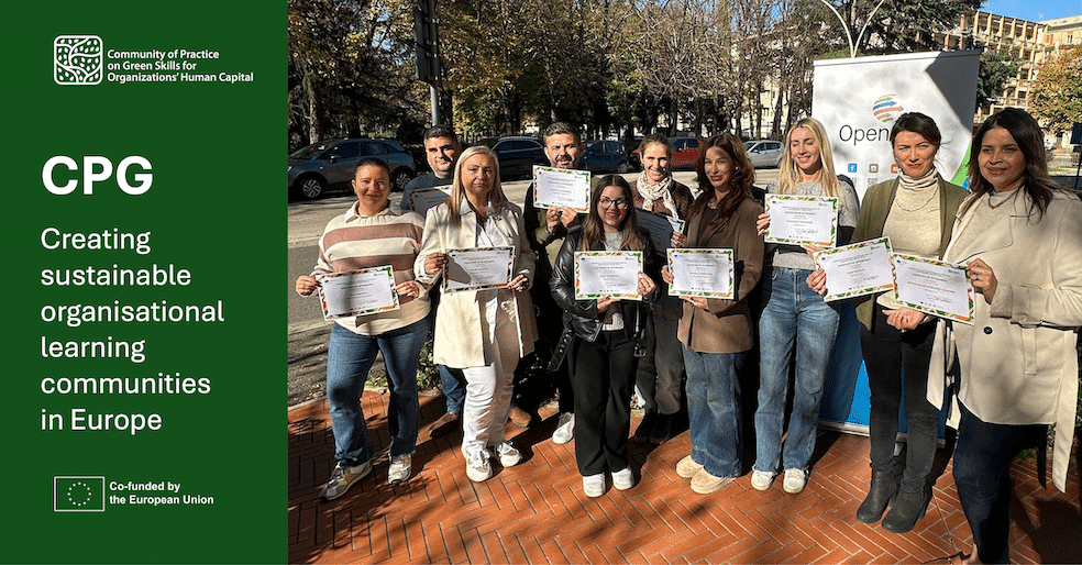 Banner for the article, a photo of people holding a certificate